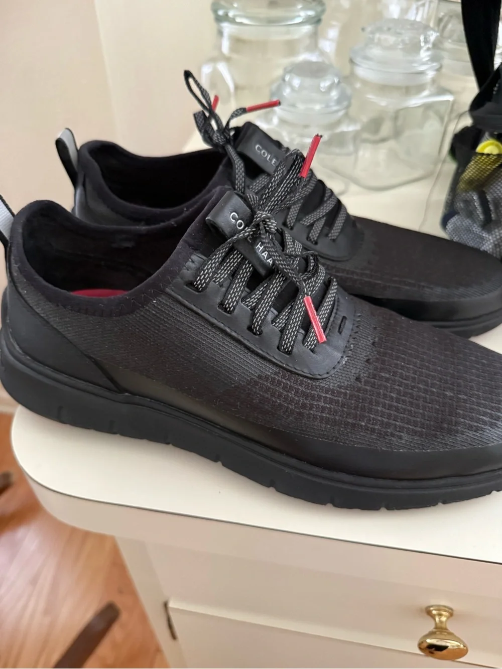 Cole Haan Men’s Black Knit Athletic Sneakers with Red Accents